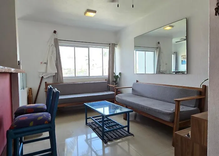 Magnifico Departamento: Beachfront Oasis with Pools and Comfort for 6